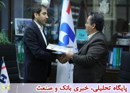 بانک صادرات ایران با فولاد آلیاژی ایران تفاهم نامه امضا کرد